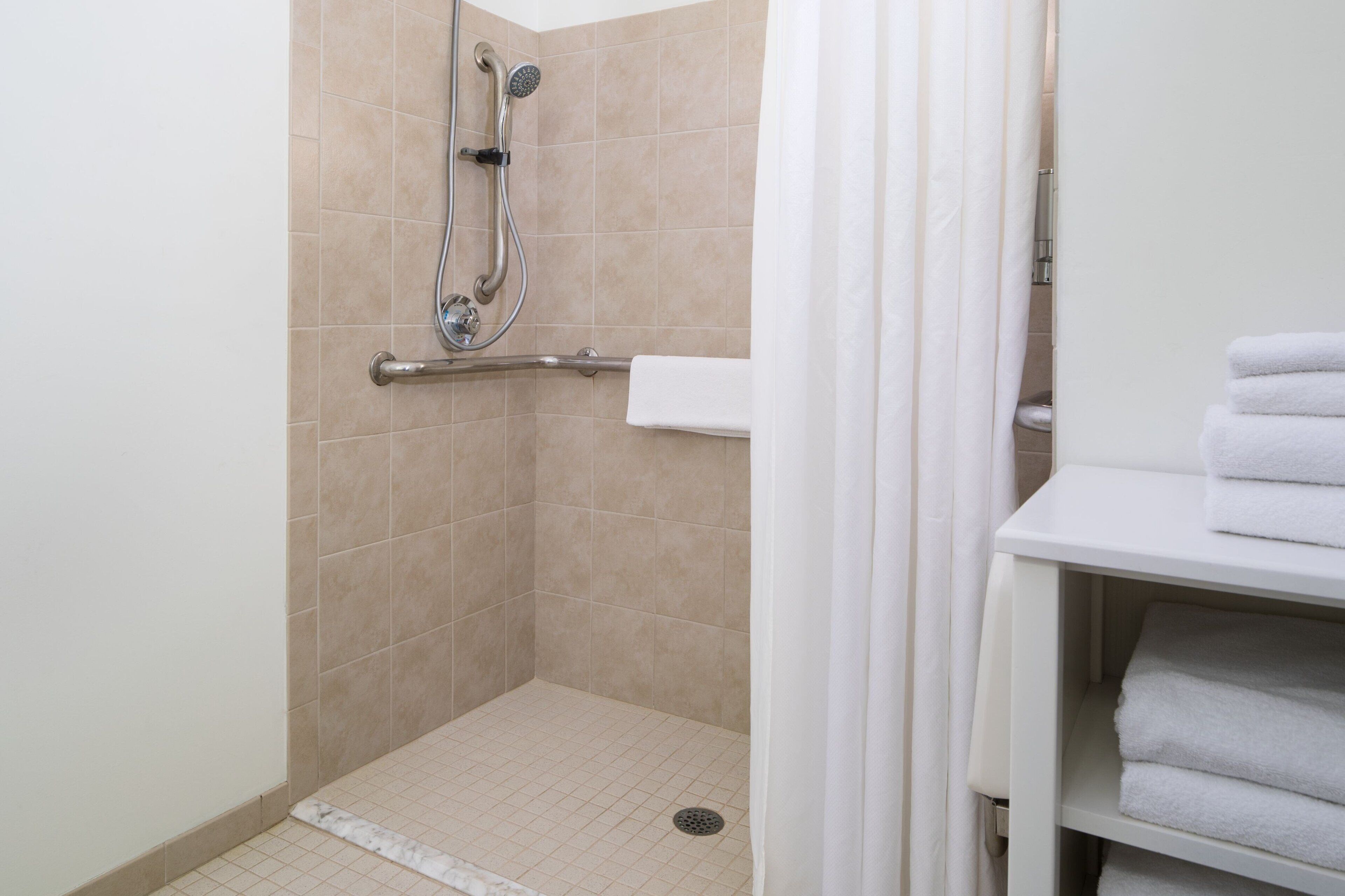 combined shower/bathtub, free toiletries, hair dryer, towels