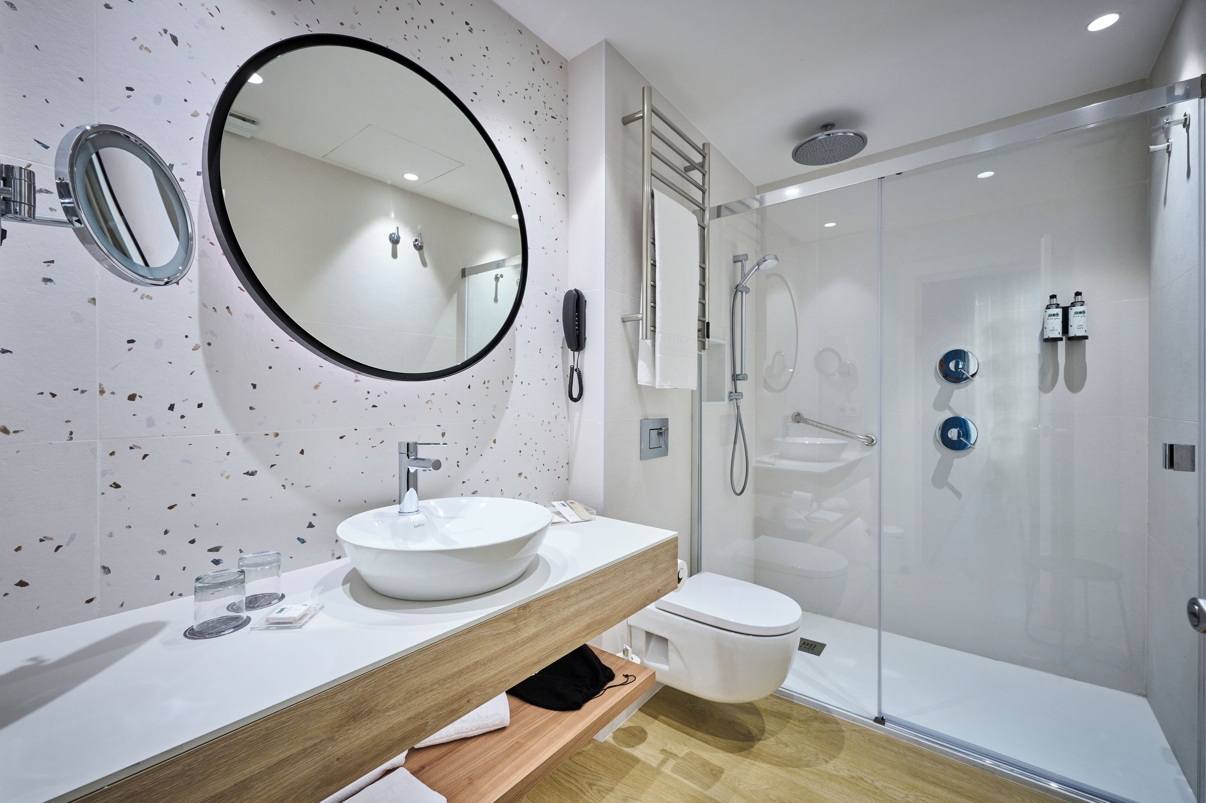 eco-friendly toiletries, hair dryer, towels