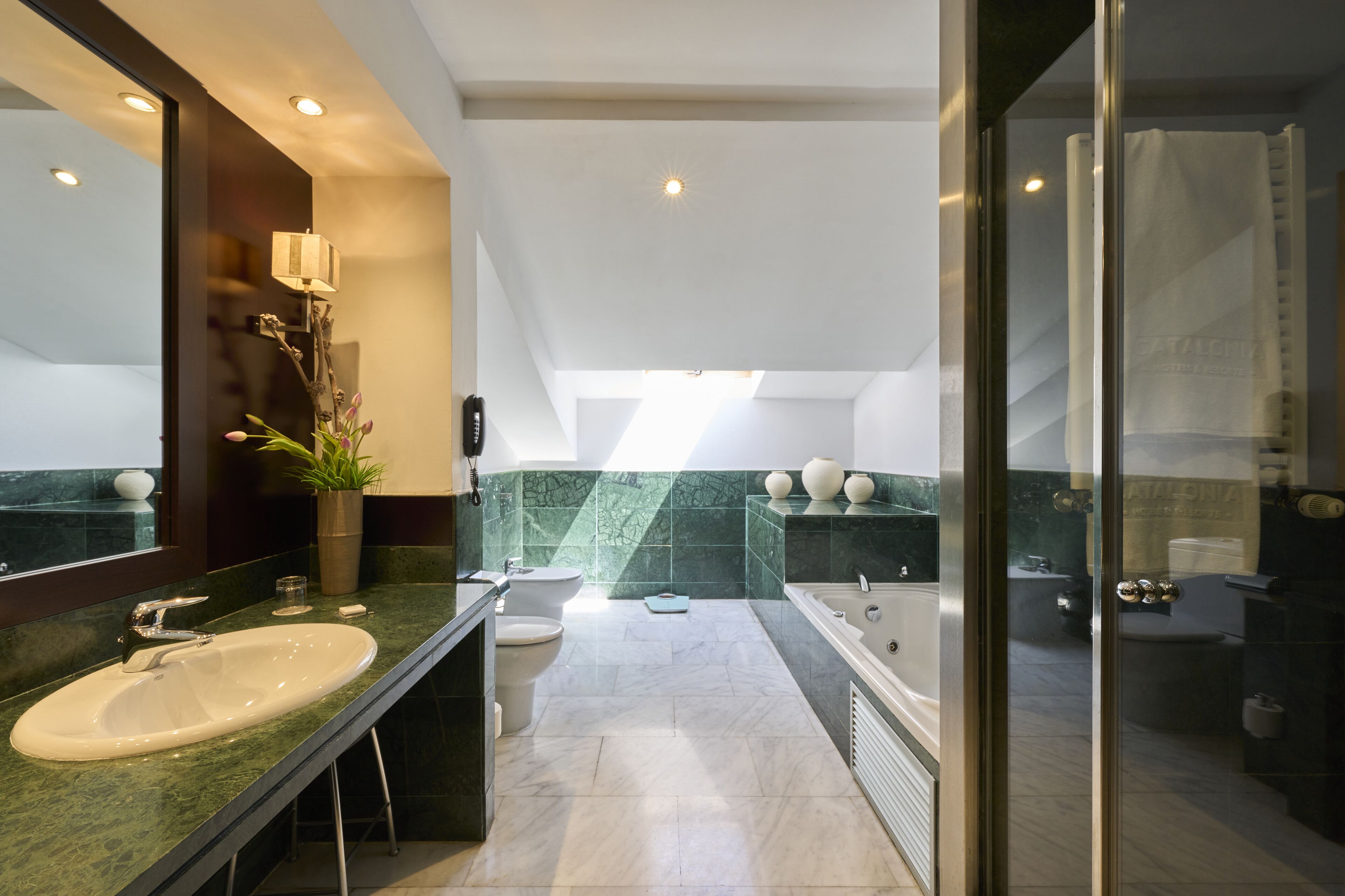 eco-friendly toiletries, hair dryer, towels