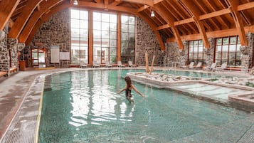 Indoor pool, pool umbrellas, pool loungers