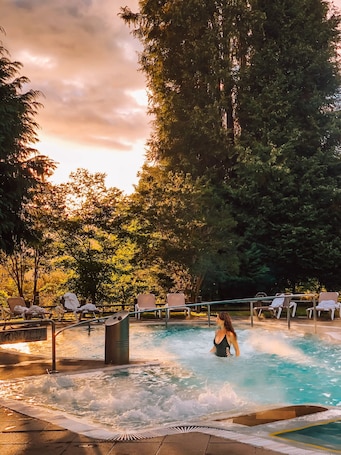 Indoor pool, 2 outdoor pools, pool umbrellas, pool loungers. Termas Puyehue Wellness & Spa Resort