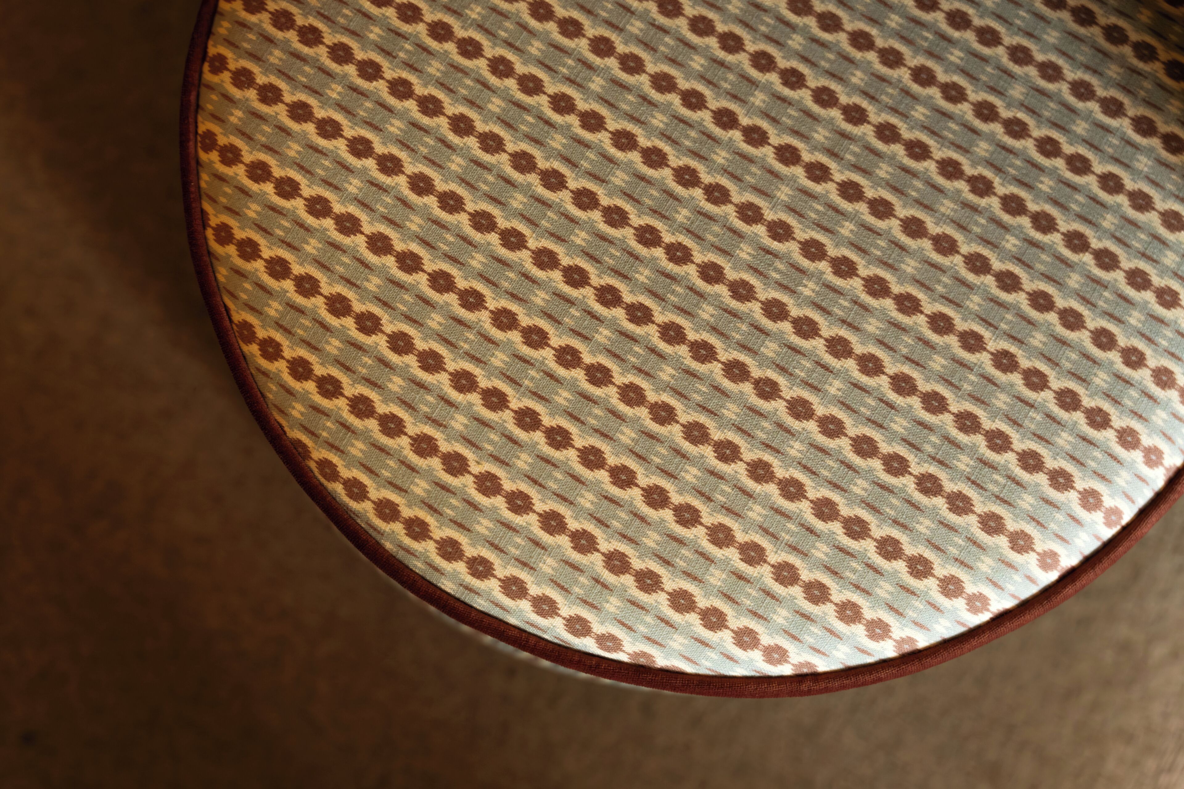 A circular object with a patterned surface.