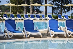 Seasonal outdoor pool, pool umbrellas, pool loungers