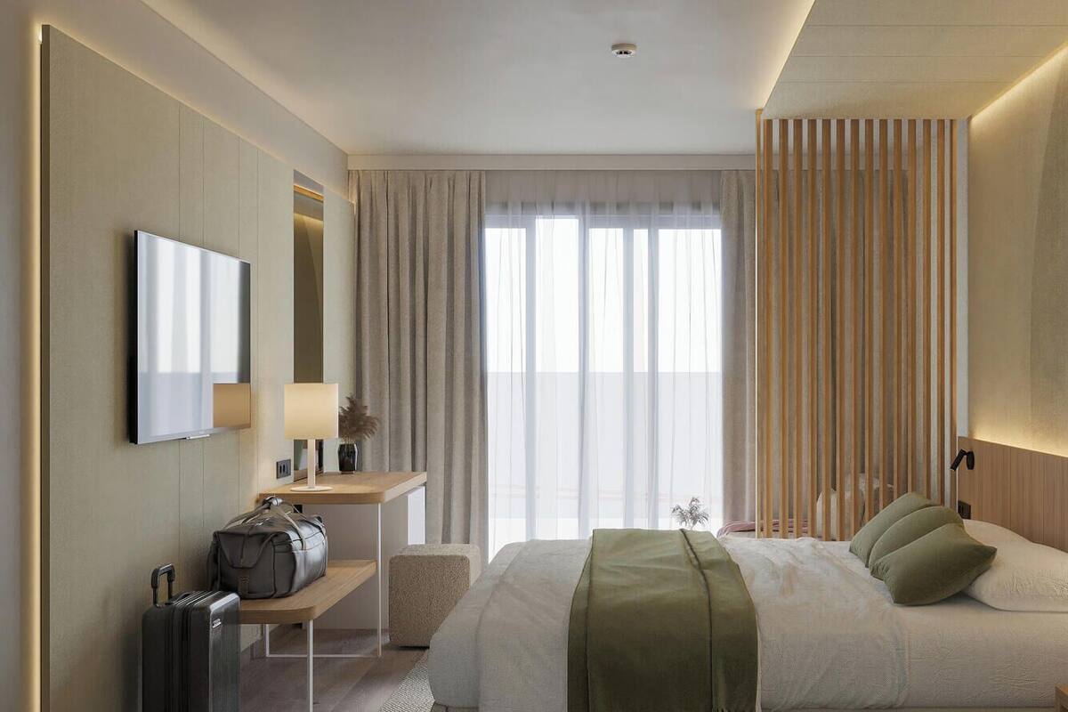 Een minibar, een kluis op de kamer, een bureau, verduisterende gordijnen