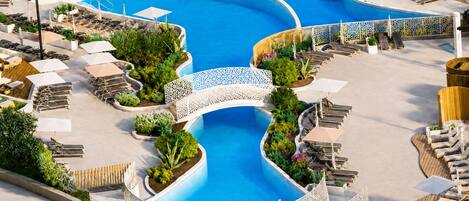 Indoor pool, seasonal outdoor pool, pool umbrellas, sun loungers