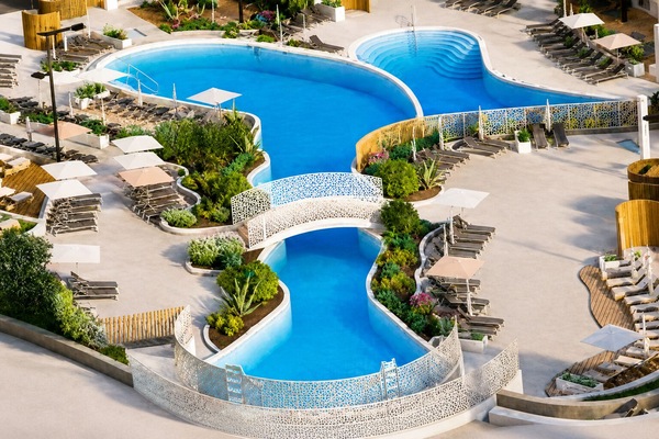 Indoor pool, seasonal outdoor pool, pool umbrellas, sun loungers