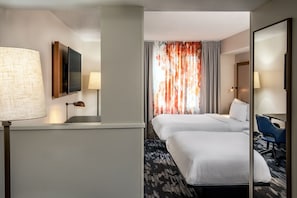 Literie hypoallergénique, coffres-forts dans les chambres, bureau