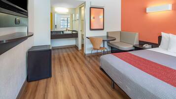 Desk, laptop workspace, blackout curtains, iron/ironing board