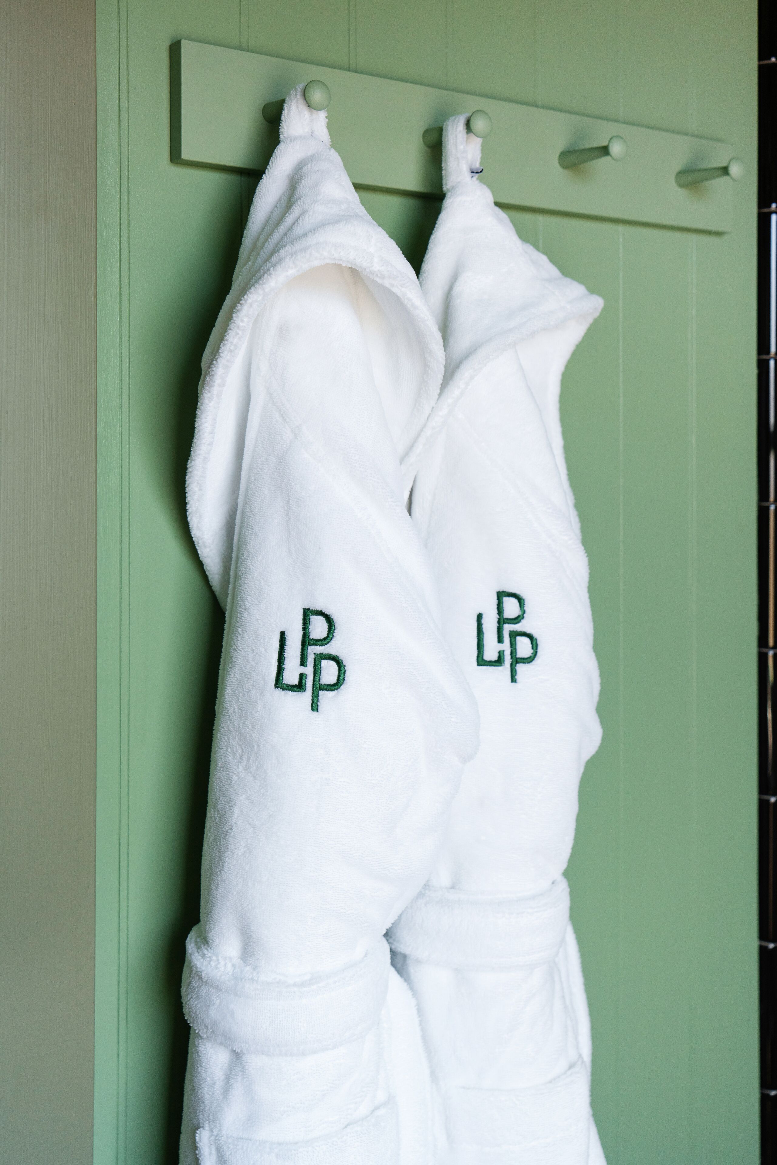 rainfall showerhead, designer toiletries, hair dryer, bathrobes