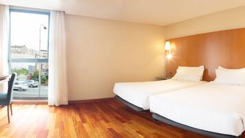 Double or Twin Room | Minibar, in-room safe, individually furnished, desk