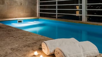 Indoor pool, pool umbrellas, lifeguards on site