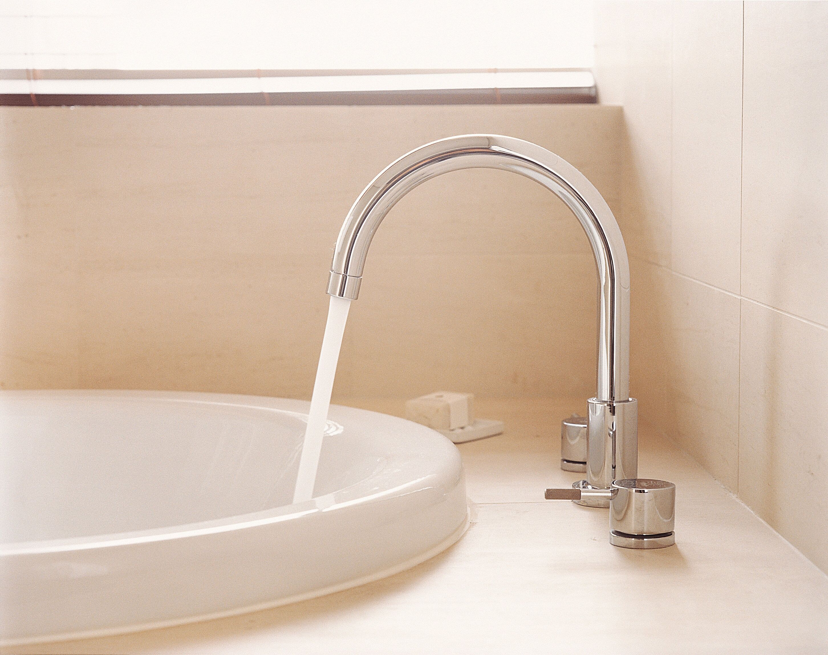 designer toiletries, hair dryer, bathrobes, slippers