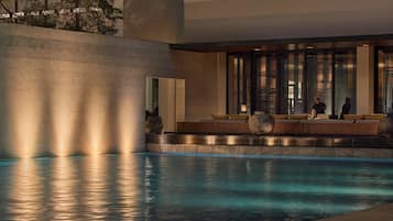 Outdoor pool, open 7 AM to 8 PM, pool umbrellas, pool loungers