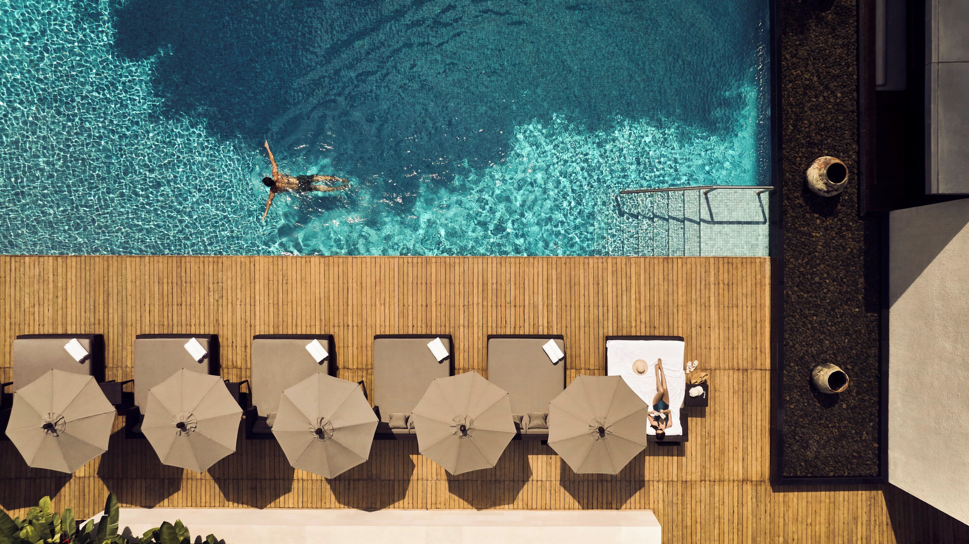 Outdoor pool, open 7 AM to 8 PM, pool umbrellas, sun loungers