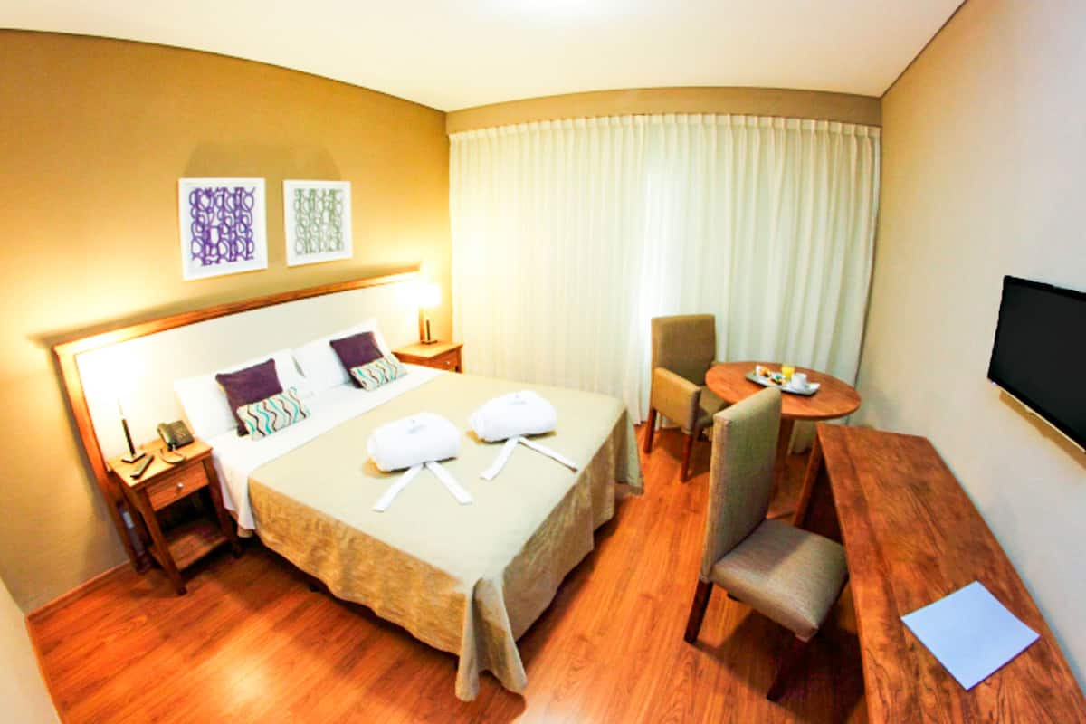 1 bedroom, hypo-allergenic bedding, down duvets, minibar