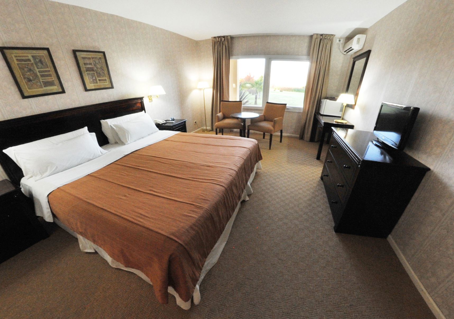 Hypo-allergenic bedding, down comforters, minibar, in-room safe