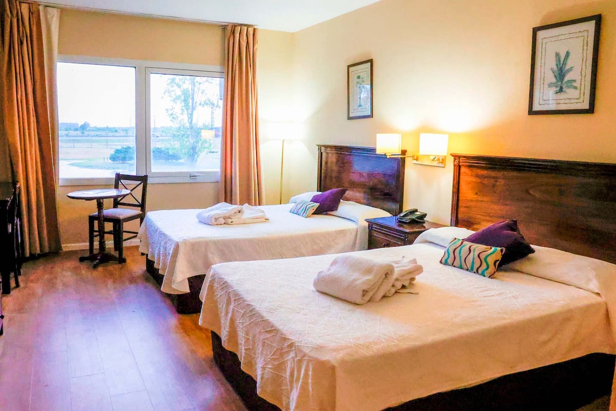 1 bedroom, hypo-allergenic bedding, down duvets, minibar