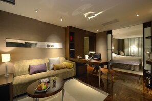 Suite, 1 King Bed, Non Smoking | Minibar, in-room safe, desk, laptop workspace