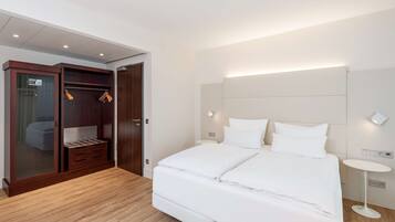 Literie hypoallergénique, minibar, coffres-forts dans les chambres