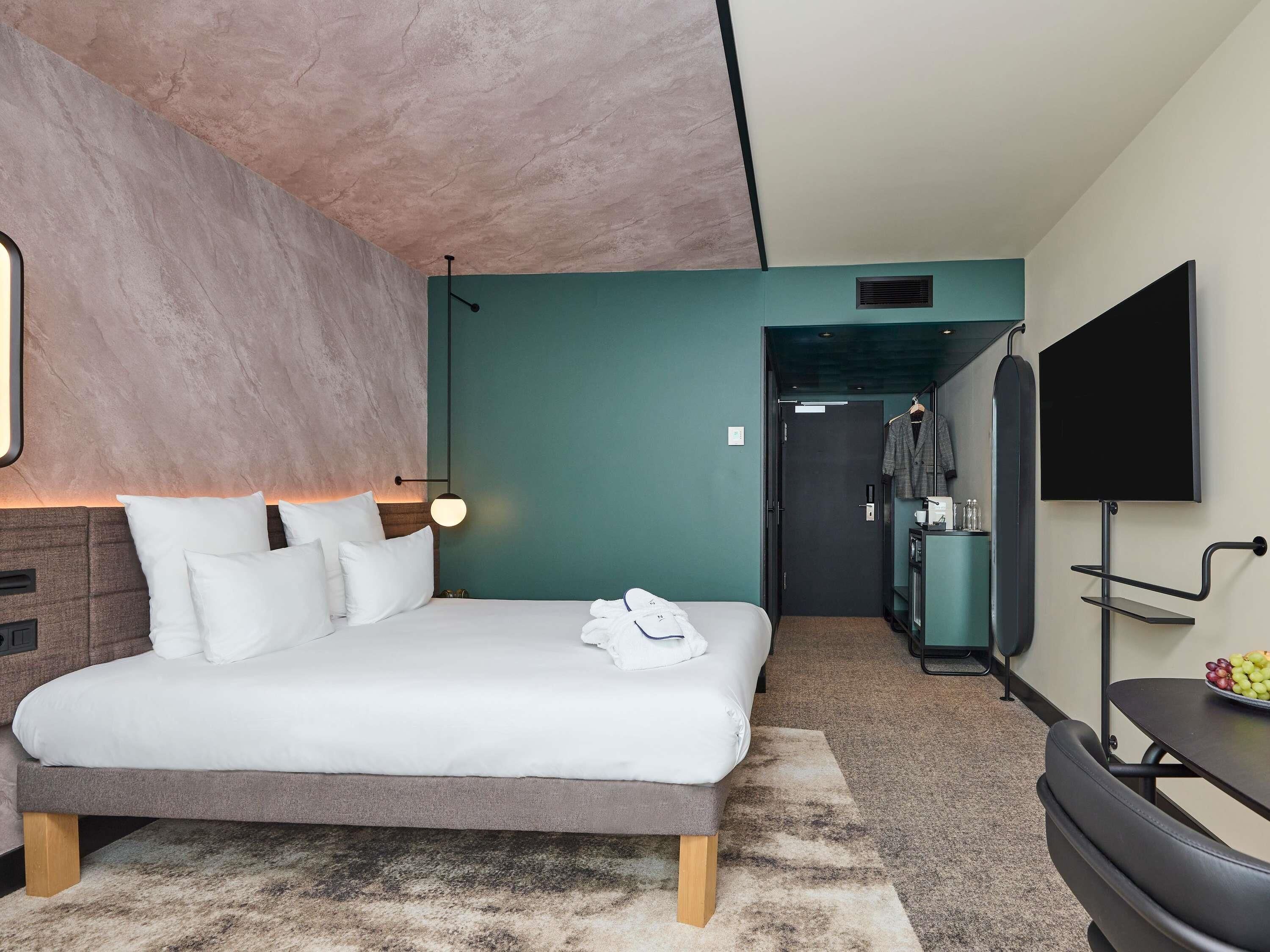 Chambre Exécutive, 1 grand lit et 1 canapé-lit, non-fumeurs | Literie de qualité supérieure, minibar, coffres-forts dans les chambres