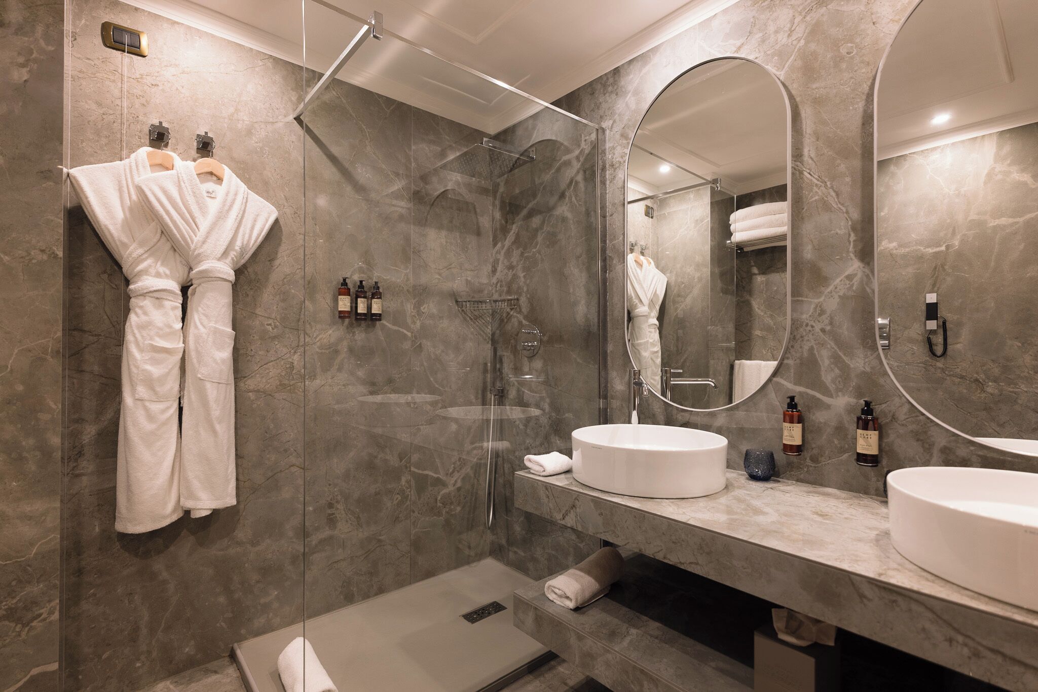 executive suite | bathroom | designer toiletries, hair dryer, bathrobes, slippers