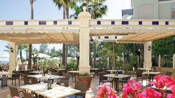 Breakfast, lunch served; international cuisine, al fresco dining