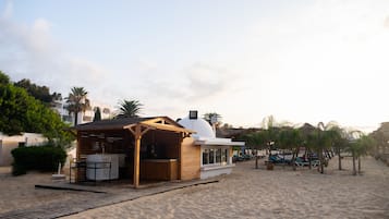 Private beach, white sand, sun-loungers, beach umbrellas