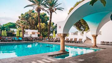 Indoor pool, outdoor pool, pool umbrellas, sun loungers