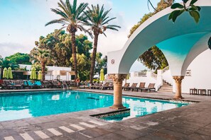 Indoor pool, outdoor pool, pool umbrellas, sun loungers