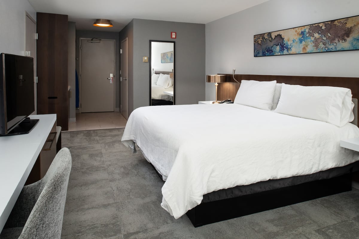 Hypo-allergenic bedding, pillow-top beds, in-room safe, desk
