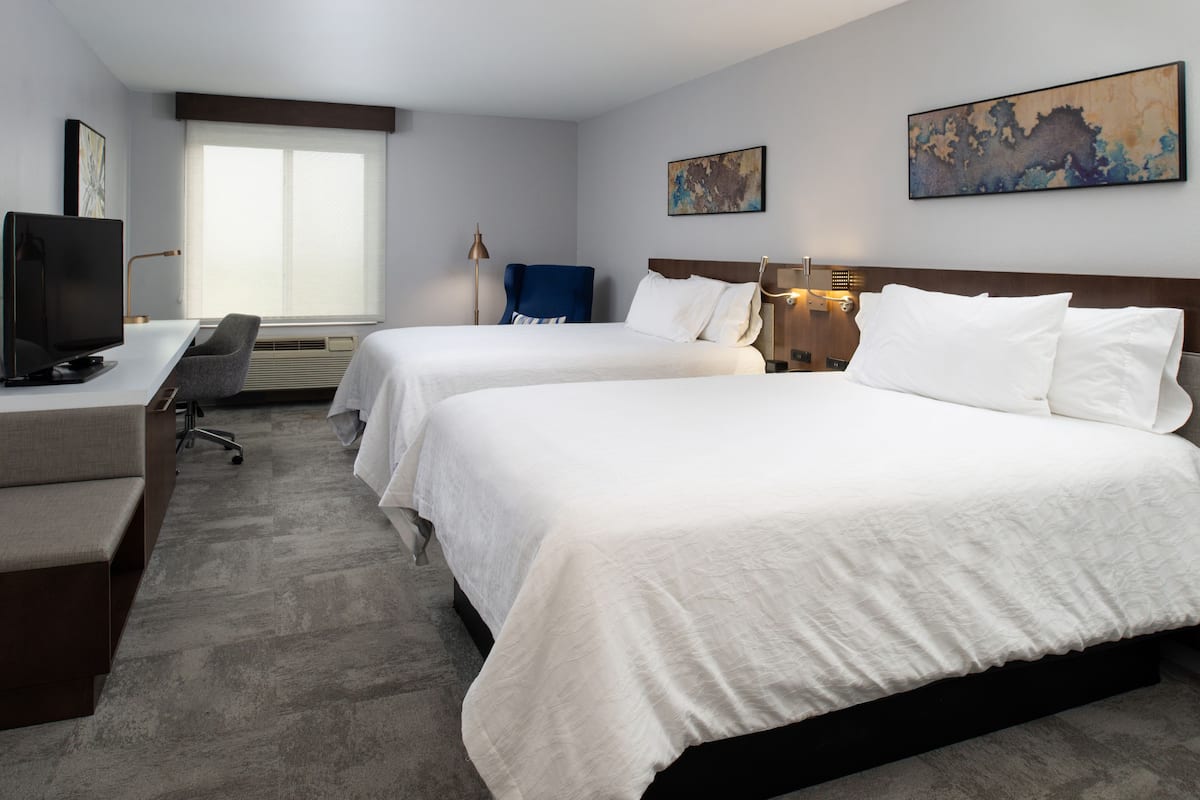 Hypo-allergenic bedding, pillow-top beds, in-room safe, desk