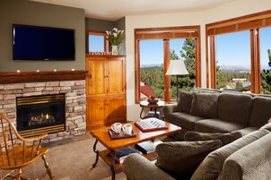 Flat-screen TV, fireplace, DVD player, pay movies