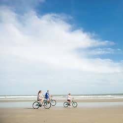 On the beach, sun loungers, beach umbrellas, beach towels