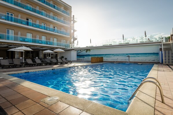 Outdoor pool, pool umbrellas, pool loungers