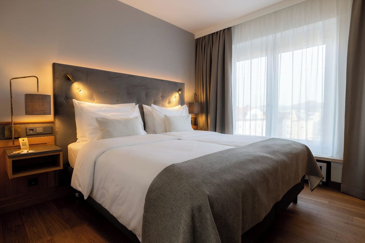 Family Room | Hypo-allergenic bedding, minibar, in-room safe, desk