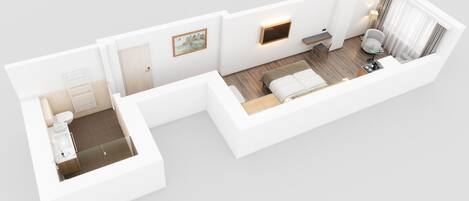 A modern apartment layout with a bathroom, a living area with a sofa and a dining table, and a kitchen.