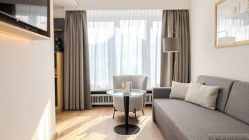Familienzimmer | Wohnbereich | Smart-TV, Netflix, Streaming-Dienste