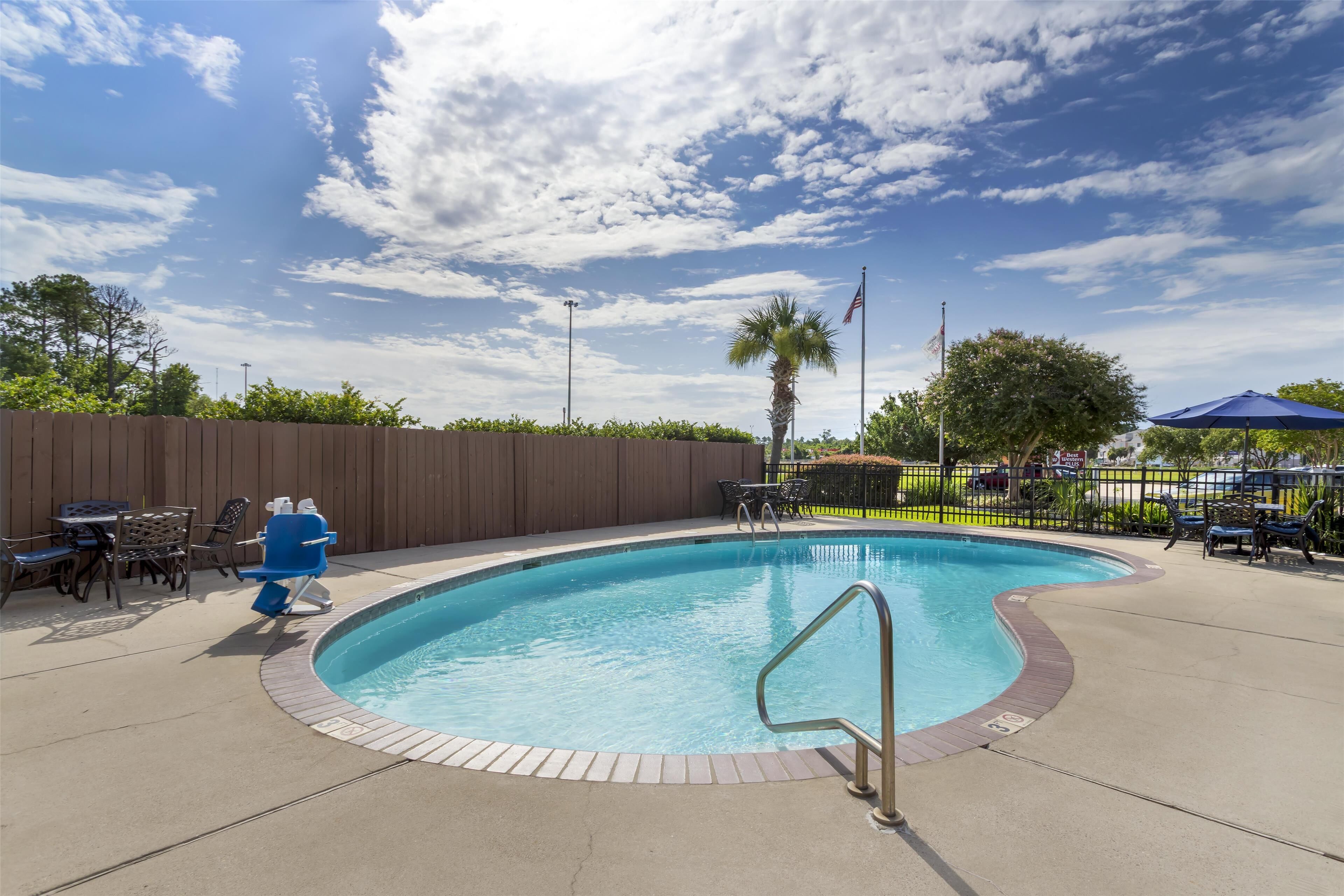 outdoor pool, pool loungers