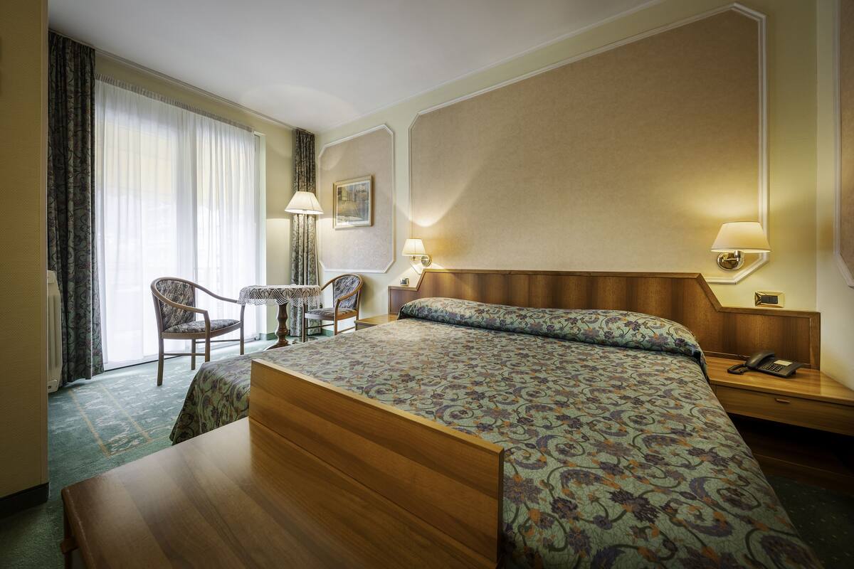 superior double or twin room | minibar, in-room safe, desk, blackout curtains