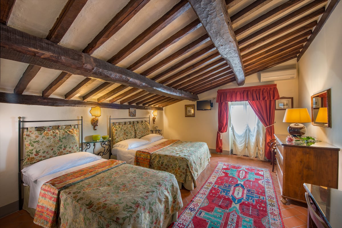 Premium bedding, down duvets, minibar, in-room safe