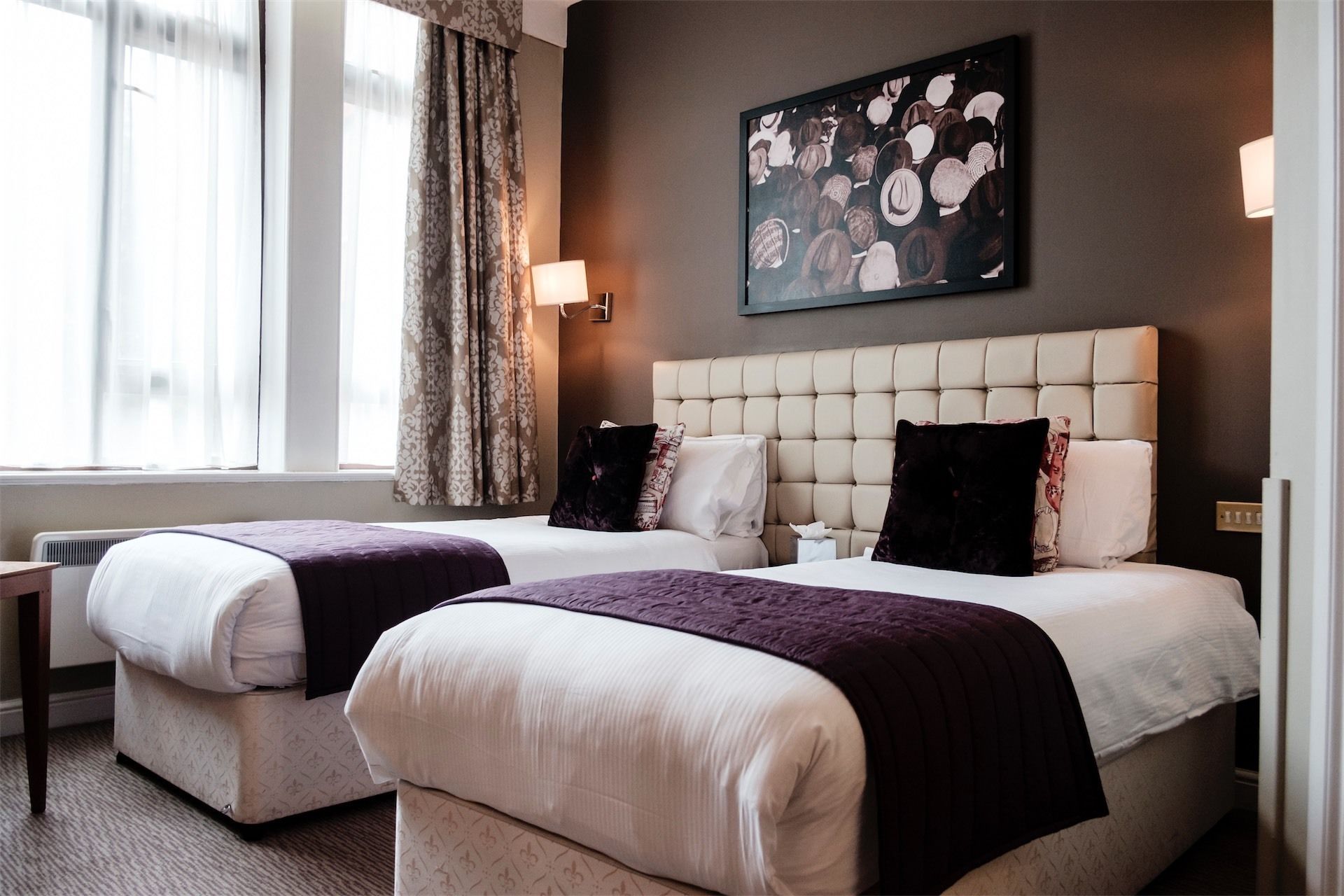 standard double or twin room | in-room safe, individually decorated, desk, iron/ironing board