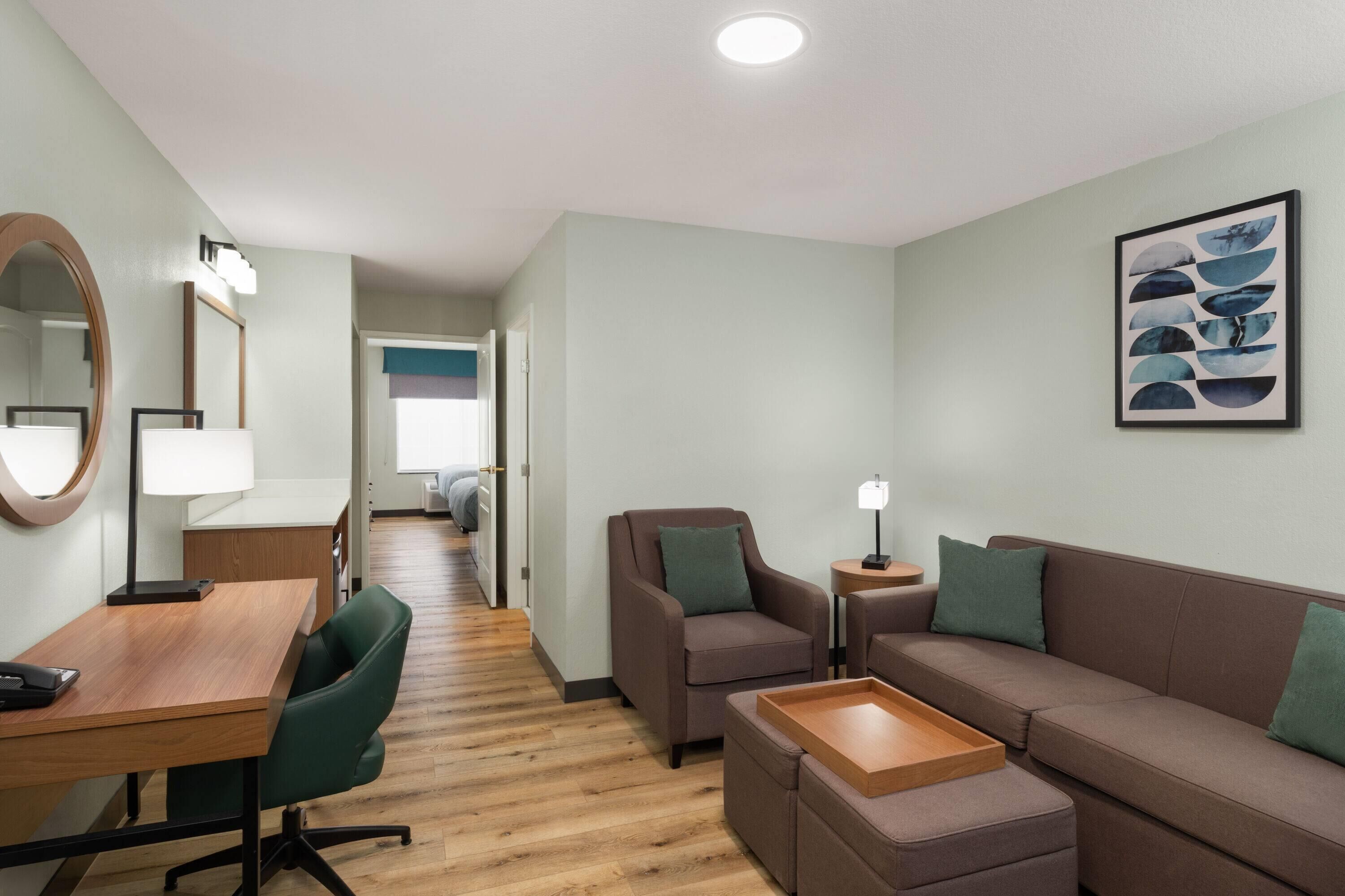 Desk, laptop workspace, blackout curtains, iron/ironing board