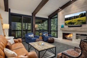 Platinum Room, 2 Bedrooms | Living area | TV, fireplace, DVD player, pay movies