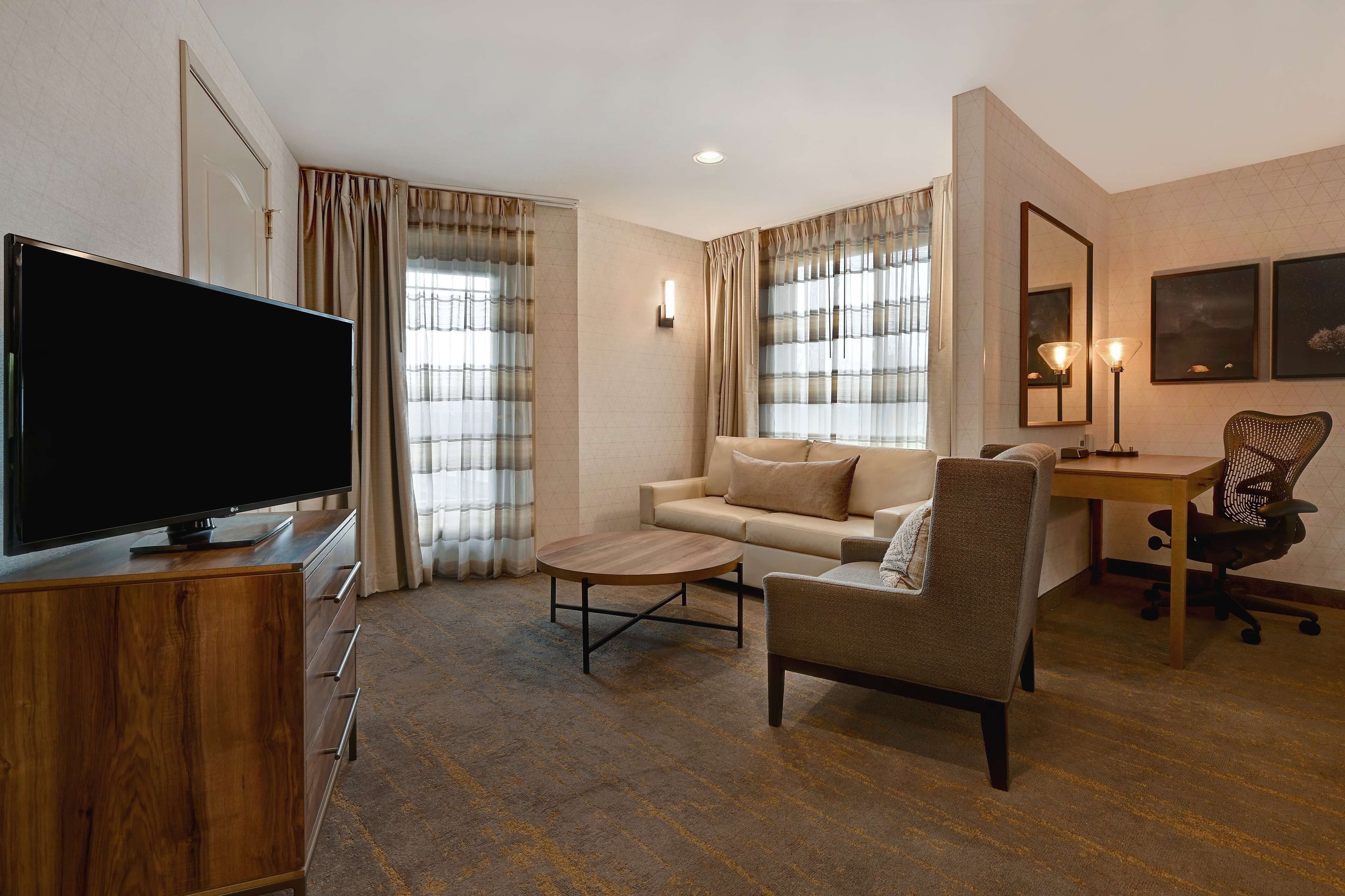 two queen bed junior suite | in-room safe, desk, iron/ironing board, rollaway beds