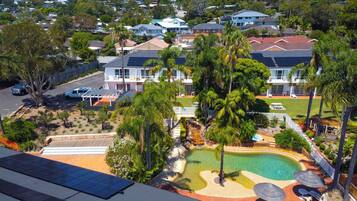 Outdoor pool, open 8 AM to 8 PM, pool loungers