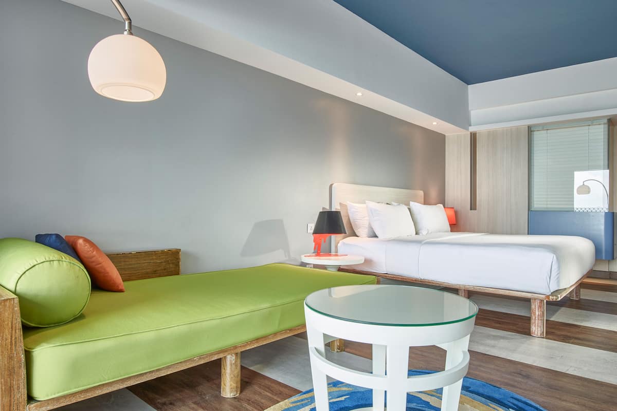Deluxe Room, 1 King Bed with Sofa bed, Balcony (Grand) | 1 bedroom, in-room safe, desk, free cribs/infant beds
