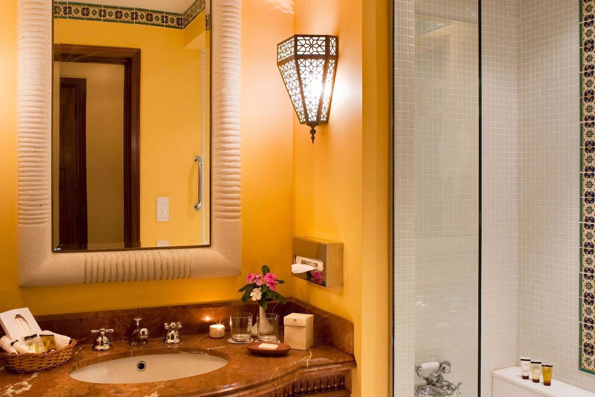 eco-friendly toiletries, hair dryer, towels