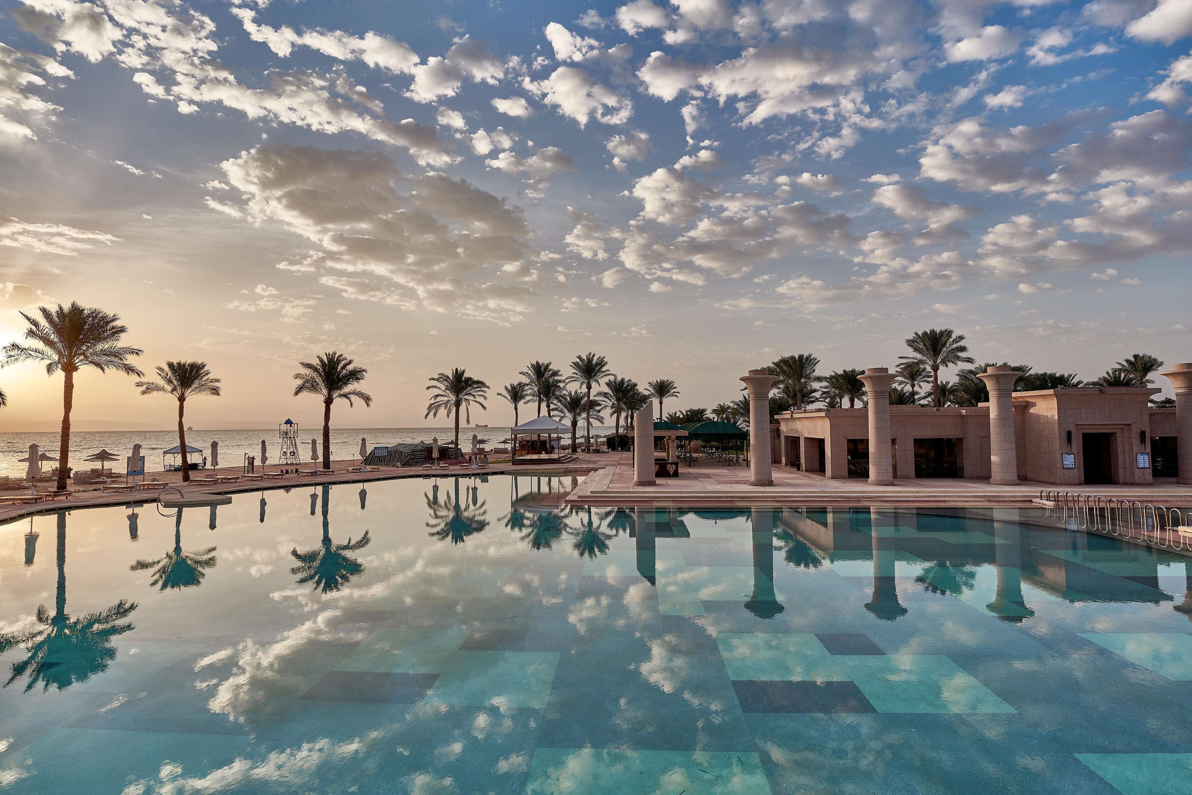 8 outdoor pools, pool umbrellas, pool loungers