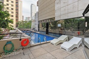Outdoor pool, open 9:00 AM to 6:00 PM, sun loungers