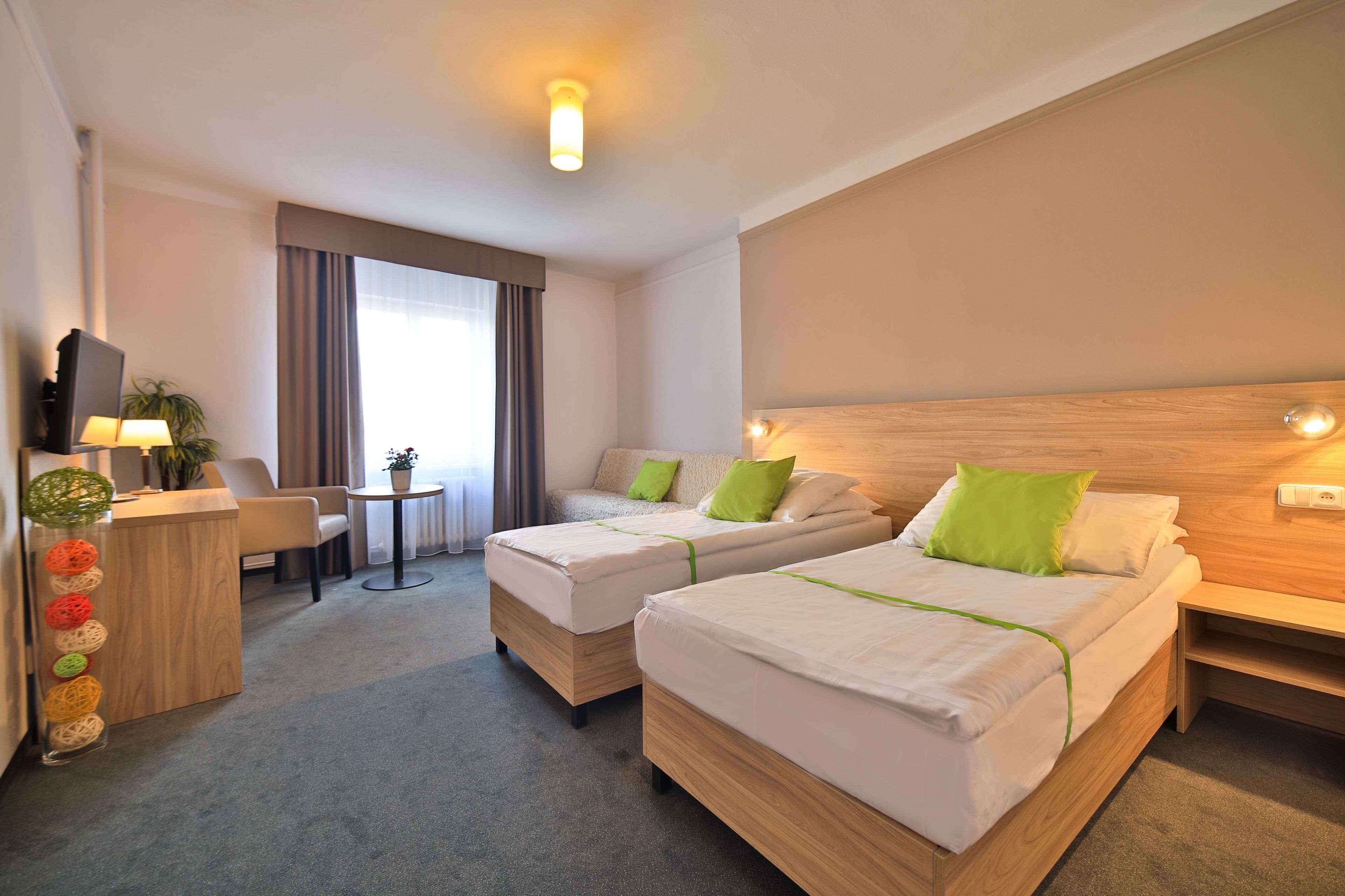 triple room | in-room safe, desk, laptop workspace, blackout curtains